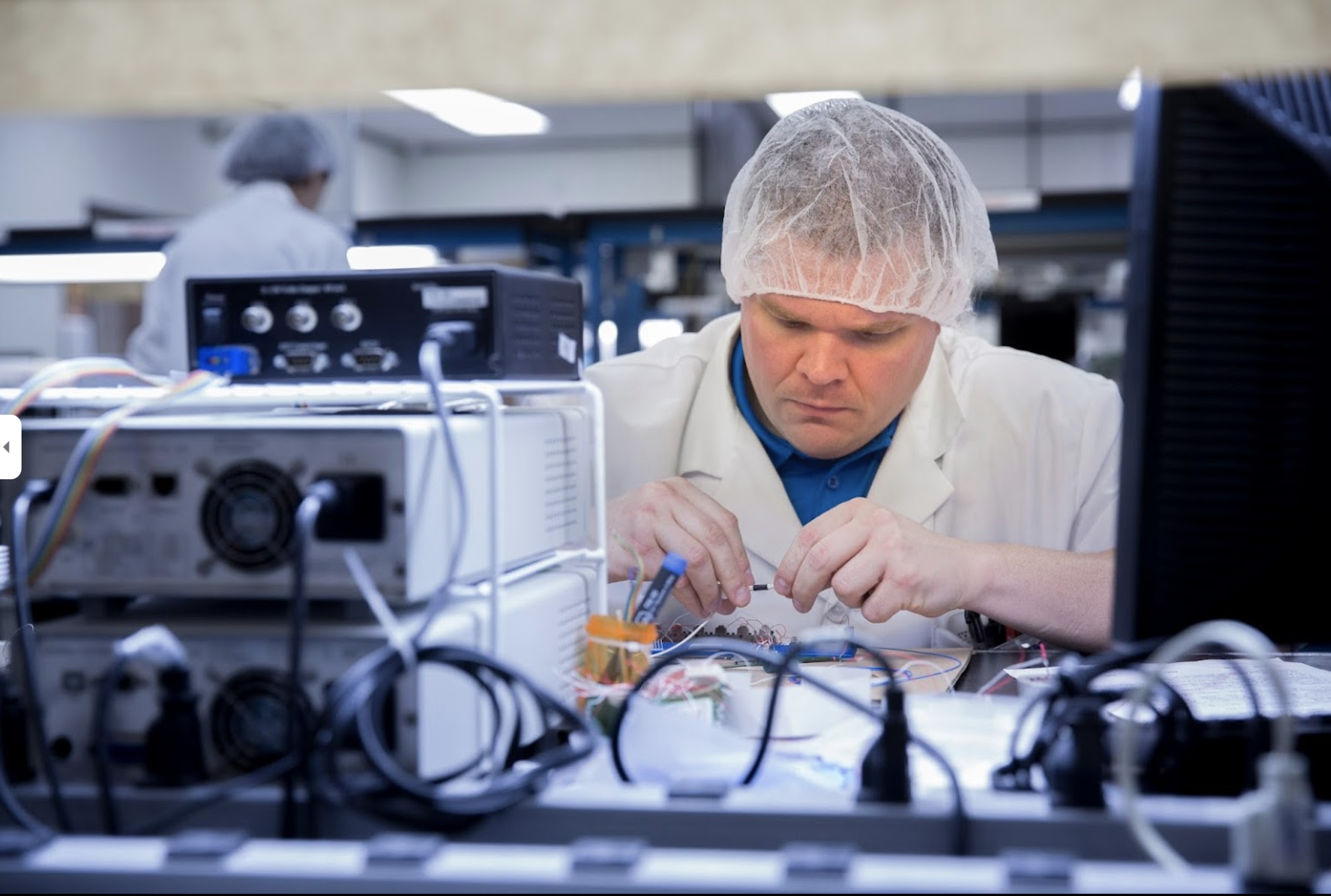 Man working with polarization instruments 